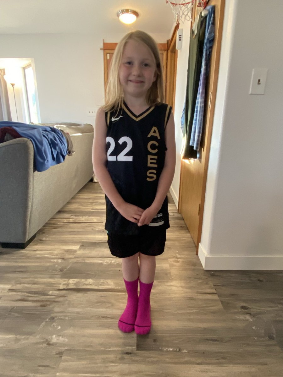 CKeef15's tweet photo. Bought my daughter her first jersey yesterday. She was so excited to wear it! Says she wants to be a basketball player when she grows up so we watched some @_ajawilson22 highlights. My little baller 💕 #WNBA https://t.co/MsMjoPlnBu