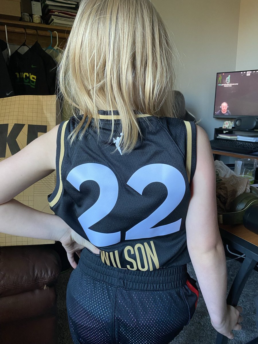 CKeef15's tweet photo. Bought my daughter her first jersey yesterday. She was so excited to wear it! Says she wants to be a basketball player when she grows up so we watched some @_ajawilson22 highlights. My little baller 💕 #WNBA https://t.co/MsMjoPlnBu