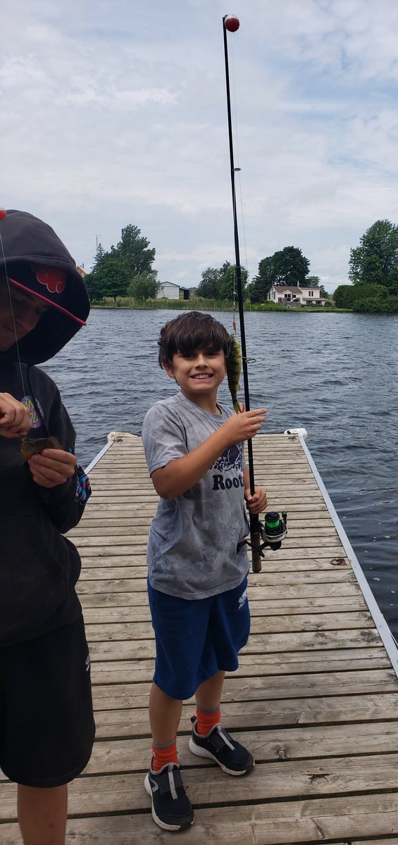 April3Conroy's tweet photo. #NationalFishingWeek @weathernetwork my pride and joys, with their first catch of the day. ❤🎣 https://t.co/H8kDmus8zX