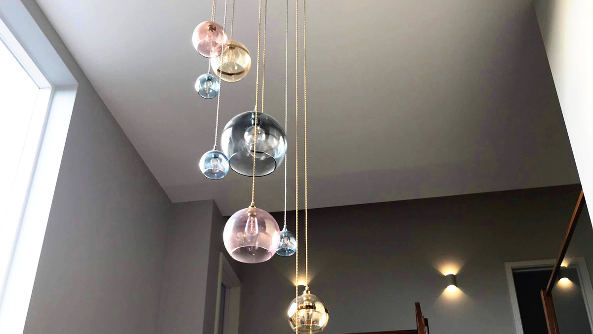 Throwing the spotlight on our custom lighting designs. This arrangement of our best selling Ella pendants features nine hand blown glass lights. Contact us to learn more.

#customlightingdesigns 
#lumisonlighting #brightideas #shopmillstreetoakham