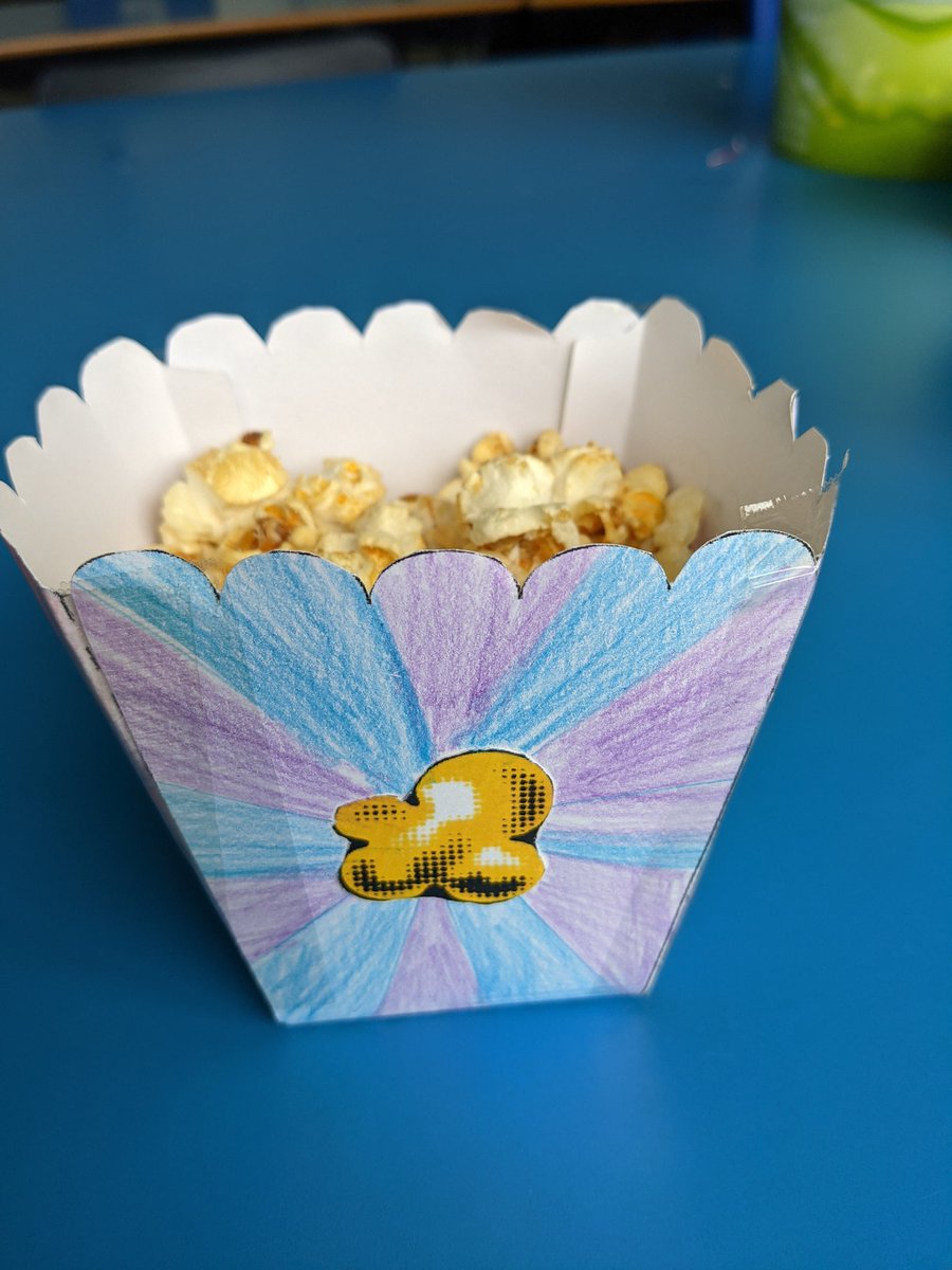 designteach_amy's tweet image. Small Graphics project to finish off the year with my amazing Y8 group. Based on pop art and yes, they held a decent amount of popcorn much to their delight! #dtchat #graphicsproject