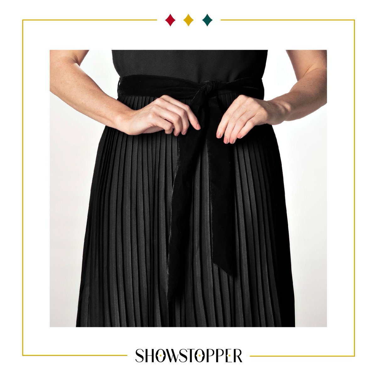 Classic and contemporary, blended in a luxurious silhouette. 
Indulge in the pleated empire waistline with exquisite golden leaf embroidery.
A touch of royalty, in every fold.
Shop now: buff.ly/34bPhds
Available in sizes XS – 4XL
#blackdress #handembroidery #dress