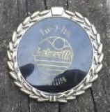 Medallion hunt clue 3!

Play sports!  But which kind Basketball,
 soccer or softball?
There are garbage cans and picnics,
(exactly what is Pickleball?). #panoprog