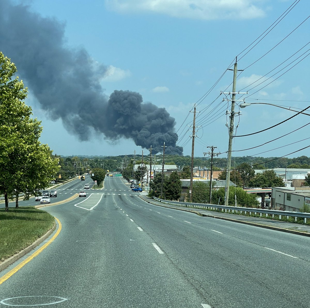 mcfrsPIO's tweet photo. (~330p Initial Dispatch) 15100blk Southlawn Ln., Rockville, Commercial Building with a large amount of debris, junked cars and tires on fire (part of the building involved) protracted incident, Area roads CLOSED, ~75 FFs on scene (on scene ‘real-feel’ temperature >100°) https://t.co/wmdfyt74hf