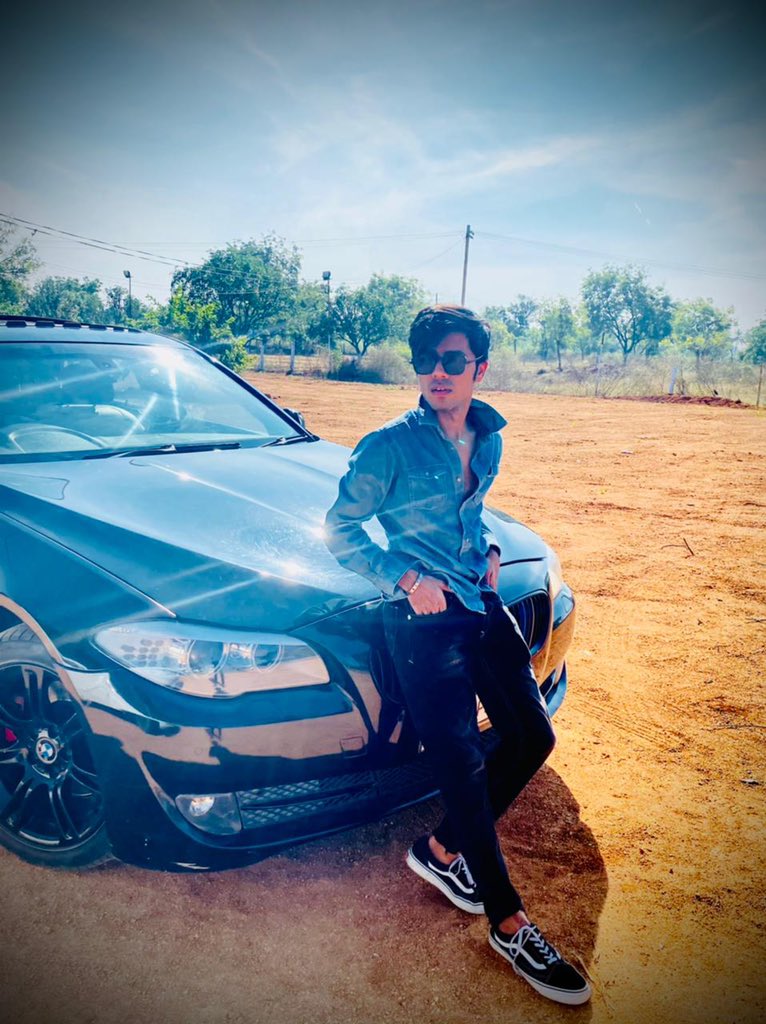 Boy posing in front of the car - PixaHive