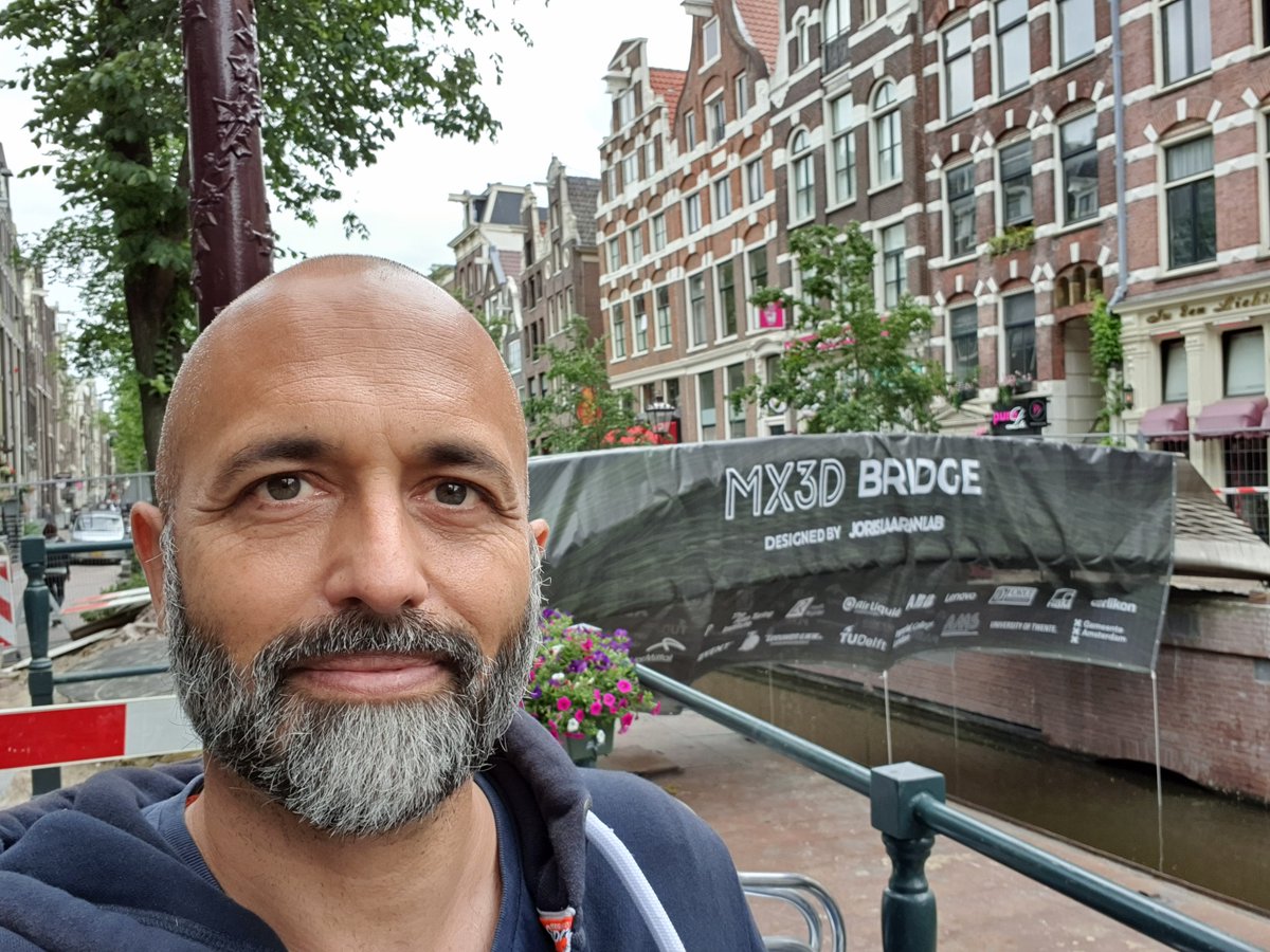 keanw's tweet photo. Blog: First glimpse of the MX3D bridge installed https://t.co/Z2cuLp9Ar7 https://t.co/Xn76J59Gmf