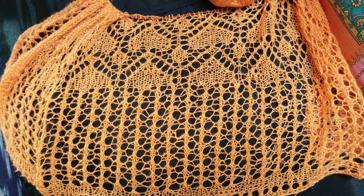 melcontent's tweet image. Progress on a version of my Thai Tropics lace shawl in a luxurious sea silk gradient set by @studioroots_joke - colorways inspired by an unusual bronze bougainvillea in our garden. See profile for link to pattern on Ravelry.  #shawlpattern #laceknitting #thaitropics #menwhoknit