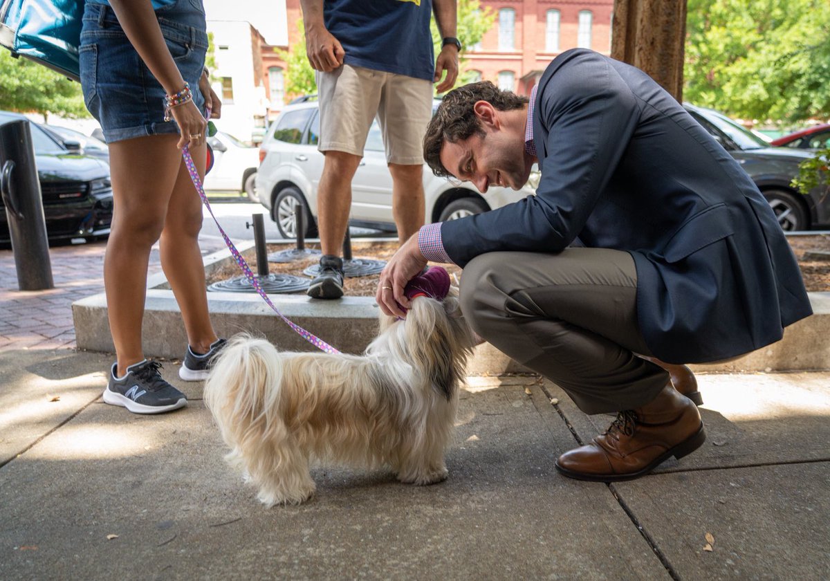 ossoff's tweet photo. This is a very good girl I met in Columbus after hosting a roundtable for community leaders on tax relief we’ve passed for the people, the future of transit and clean energy, and voting rights. https://t.co/KSvBofEErd