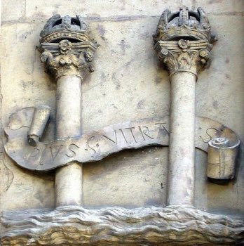 As you see in the coat of arms, the pillars were often represented as actual pillars, usually depicted with an S-shaped scroll of ribbon wrapped around them. Here is another example, from the town hall of Seville. 9/12