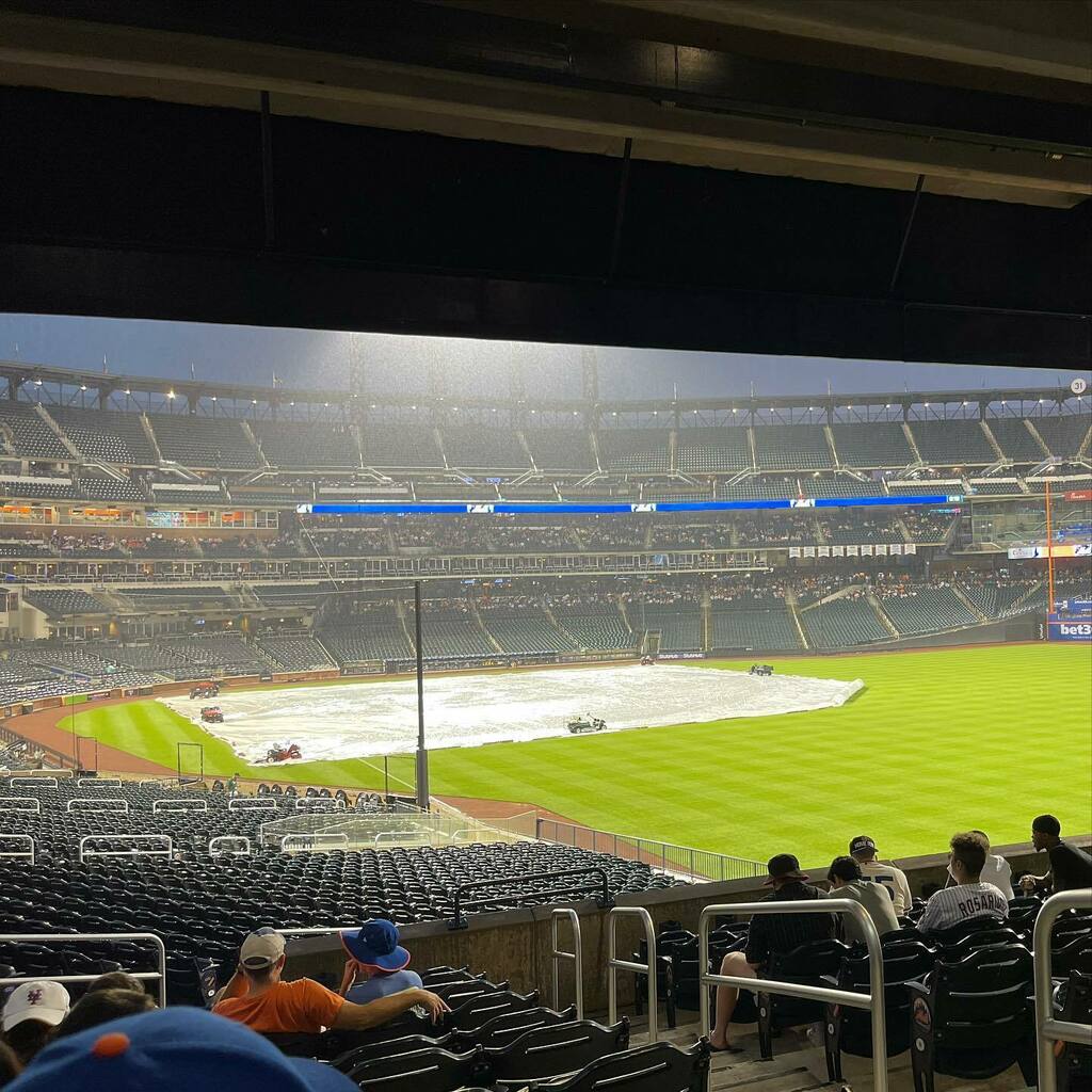 the_jlp's tweet photo. First Mets game is a monsoon! #GoBraves⚾️ https://t.co/ySFcjDa0bp https://t.co/ti7dFbYSF9
