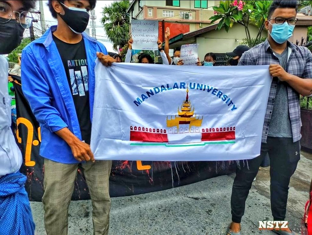 HninHnin28's tweet photo. Mandalar University Students Strike hit to streets and protested against the dictator with colorful smokes on the 59th anniversary of the 7July student uprising. 
#WhatsHappeningInMyanmar 
#July7Coup 
#StopTorture https://t.co/KdiMjygbj2