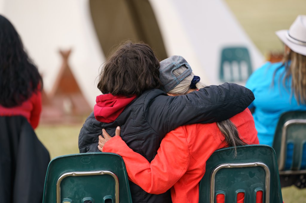 JustinTrudeau's tweet photo. After hearing from residential school survivors and seeing the unmarked graves in Cowessess First Nation, it’s hard to find words that are enough. But to all those affected: Know that I am here as your partner, to walk the path of reconciliation and right these historical wrongs. https://t.co/BSYHc336Fw