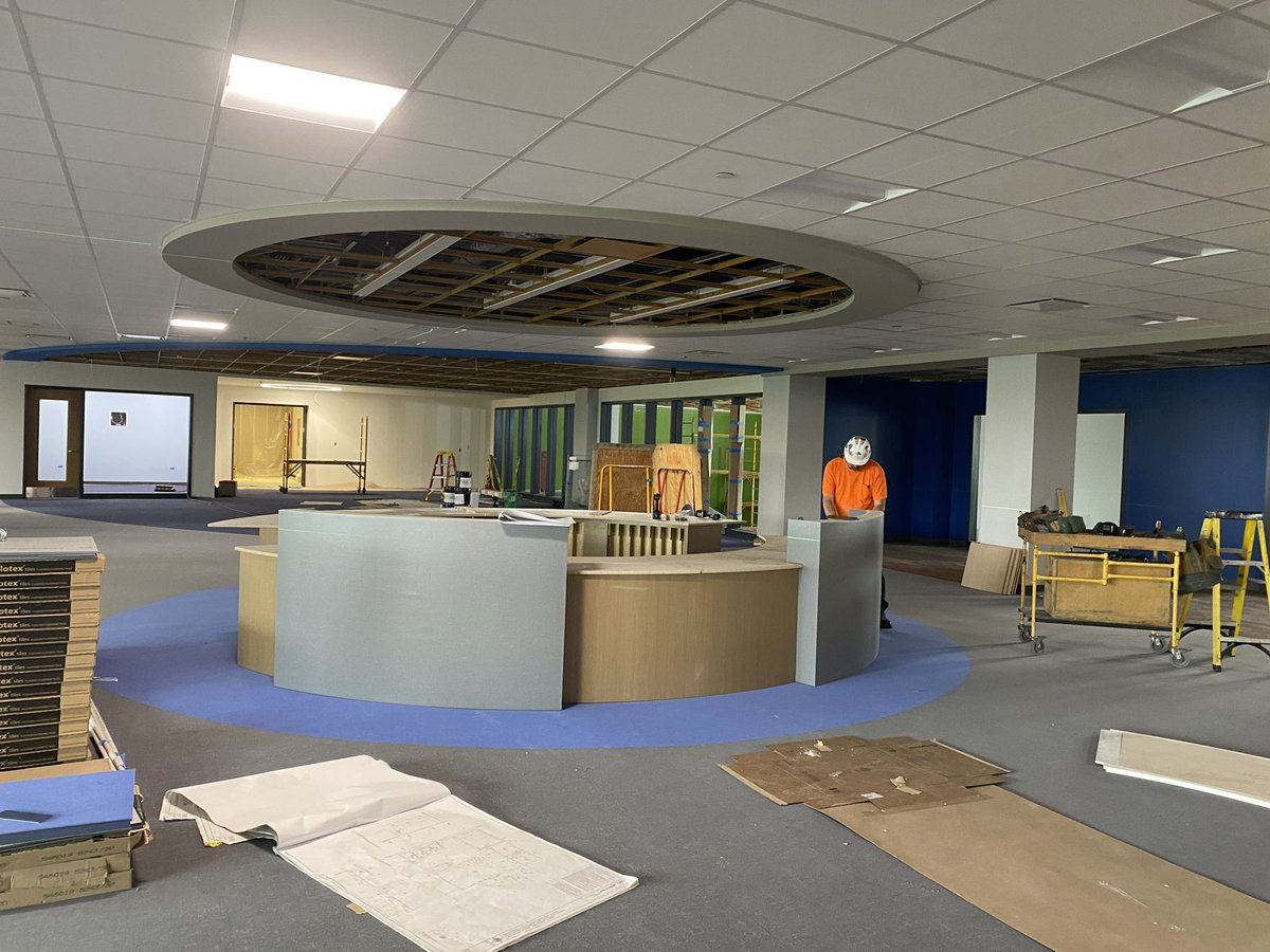 HS library - great progress being made - circulation desk and Genius Bar being  installed.