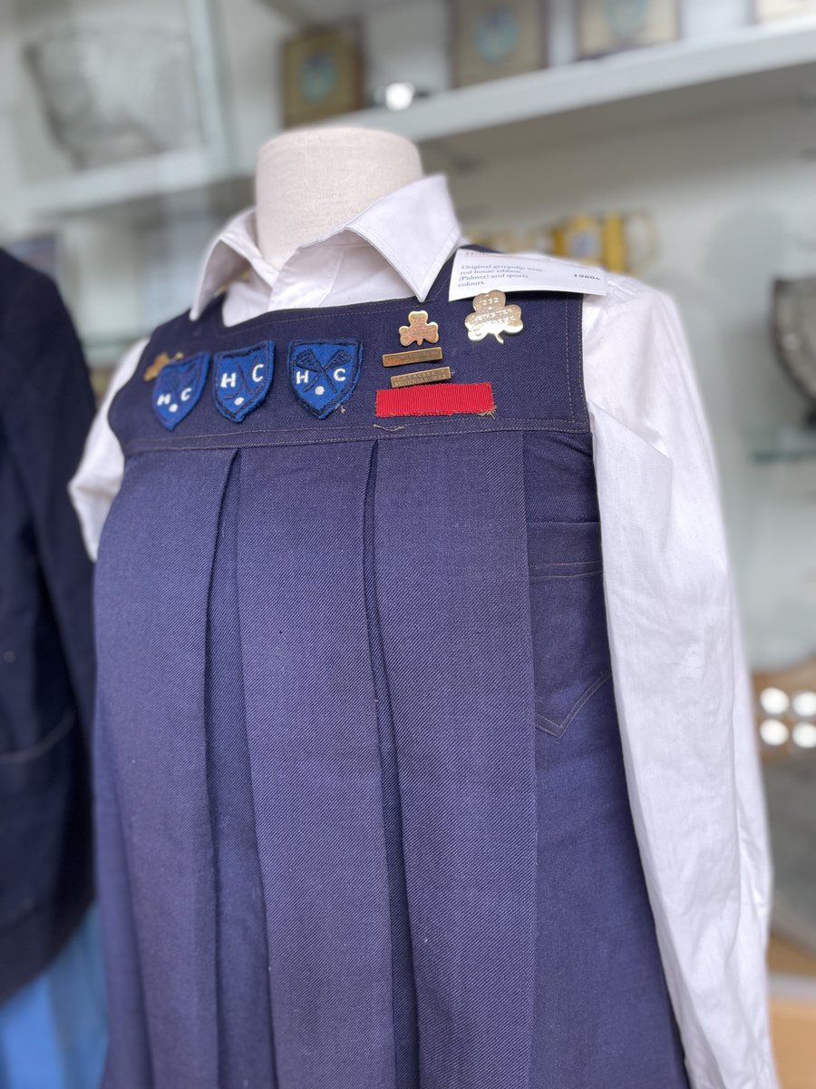 RathdownAlumni's tweet photo. Hillcourt tunic with hockey and lacrosse badges 1957, 1958, and 1959, and hockey and lacrosse school colours. #exploreyourarchive #schoolhistory #dresshistory https://t.co/gym6pLucRa