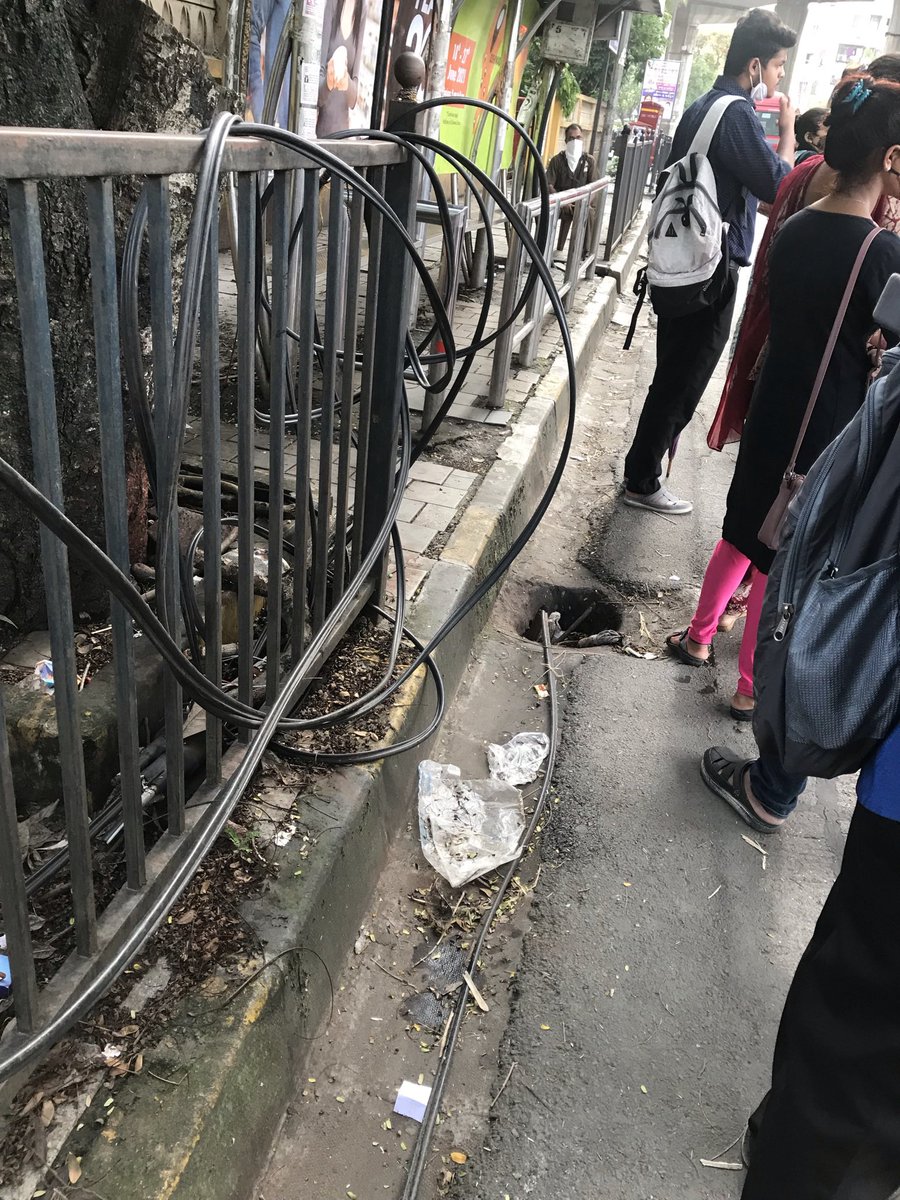 ManuShivdasani's tweet photo. @mybmc @mybmcwardKW These holes in the gutter are dangerous for people waiting at the bus stop at 7 Bungalows (below Metro Stn., going towards Versova). Please do something before someone gets hurt. #MakeIndiaSafe https://t.co/udjFL30XSS