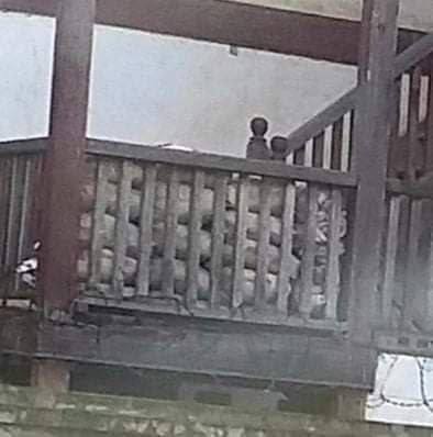 Yaellie2's tweet photo. SAC terrorists are seen forcibly stationing with full weapons and sand bags as bunker at the entrance and on the buildings of Basic Education High School, Natmatee.  #WhatsHappeningInMyanmar #July7Coup https://t.co/uKWTLnpkJ0
