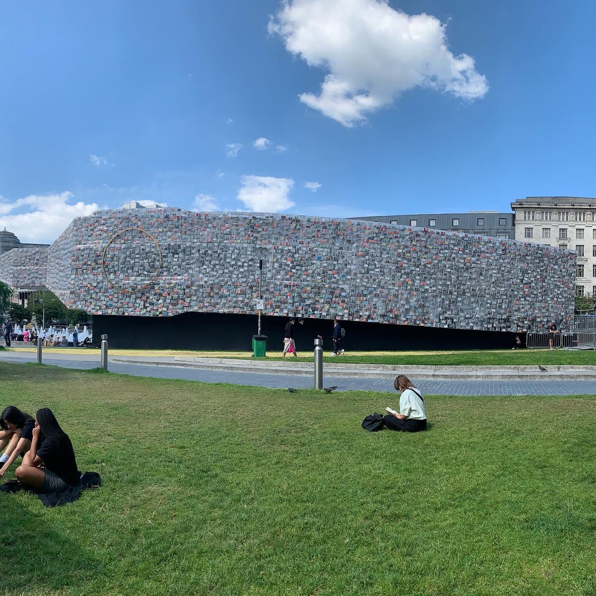 AIUCentre's tweet photo. We’re delighted to see our recommendations among the 20,000 political books covering @mifestival & @martaminujin’s #BigBenLyingDown monument in Piccadilly Gardens. You can read the full list in our new blog post. https://t.co/64ZkdN8hEe #mif21 https://t.co/VQoh51WyYs