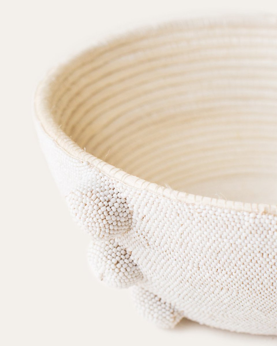 The joys of completing hours of meticulous handiwork. Our hand-beaded pieces crafted with delicate detail by female artisans in Rwanda using hundreds of locally-sourced beads that are hand-stitched onto woven sisal fiber!  bit.ly/3jhyryK

#artisanmade #empowerwomen