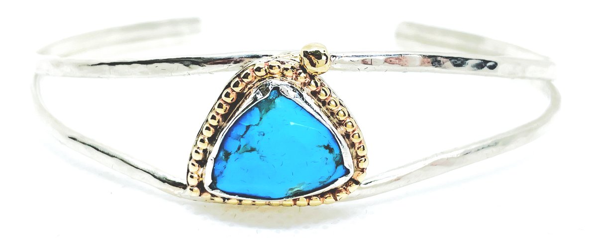FIMuseum's tweet photo. Also for auction will be this silver and turquoise bangle made in the Falklands by the talented Emma Brook - one of the #FIMNT Trustees. #Falklands #FalklandIslands #Auction #Fundraising #Museums https://t.co/2ddYFA1sNY