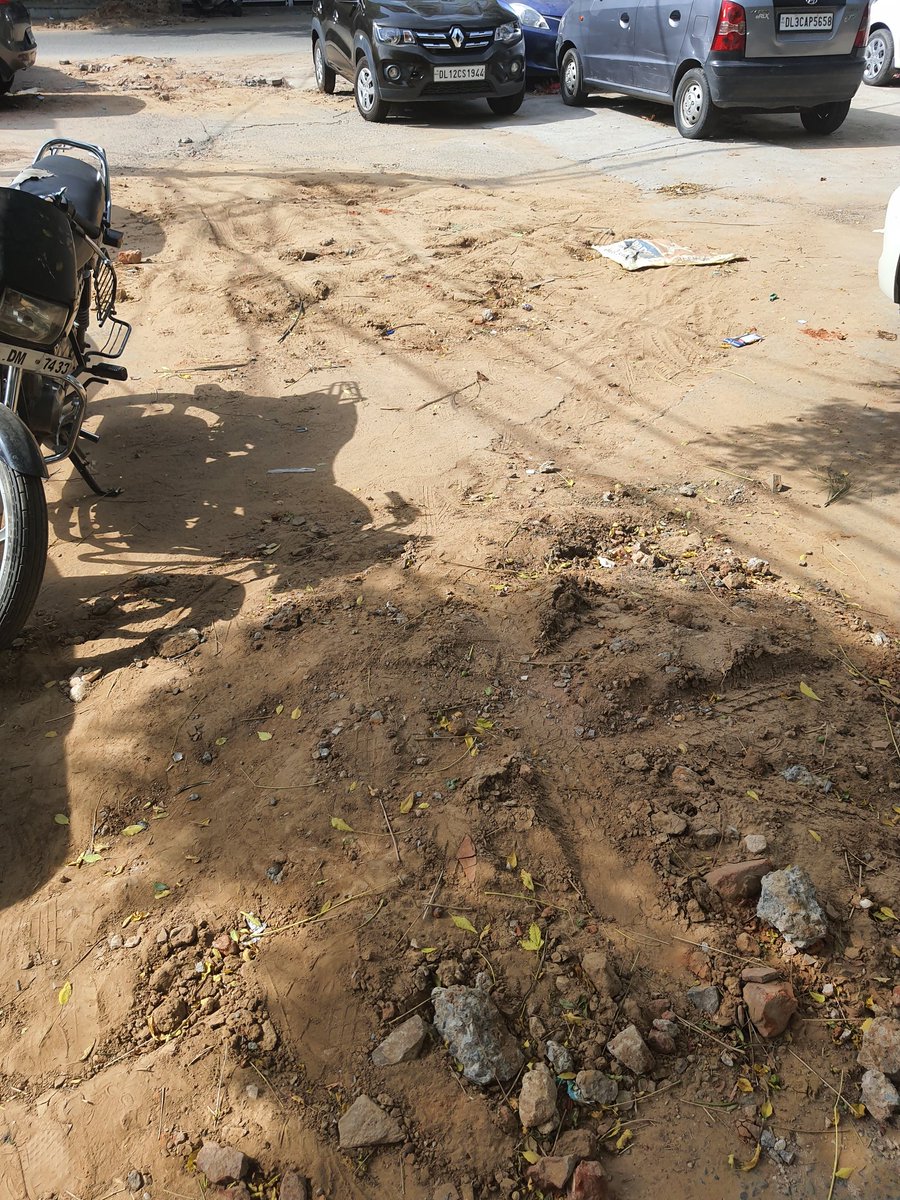 Manshu101's tweet photo. As you can see in these photographs my shop Malviya Nagar Block H5/16, SRL Diagnostics. 
ACT @ACTFibernet did this digging all to set fiber cable  and now this area is all muddy puddle in front of my diagnostic center. 
#sdmc #mcdsouthdelh @MCDdelhi @DrNandiniBJP Need your help🙏 https://t.co/Jw32mGgLK5