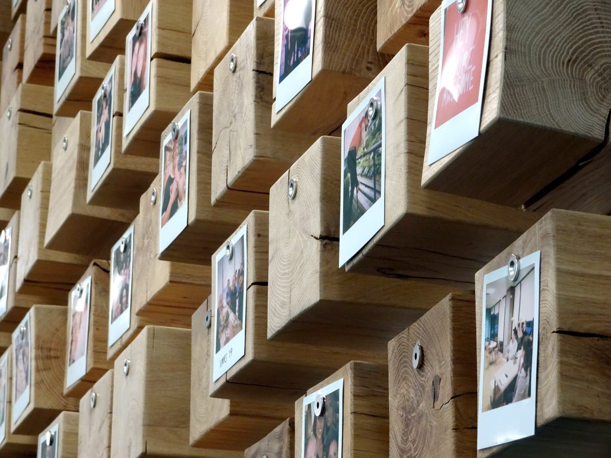 We love this social wall which we created as part of our design at EMW Law. Employees are encouraged to print photos from their phone on a Polaroid printer as a talking point about what they’ve been doing recently. It’s a great idea for team building &amp; to encourage engagement.