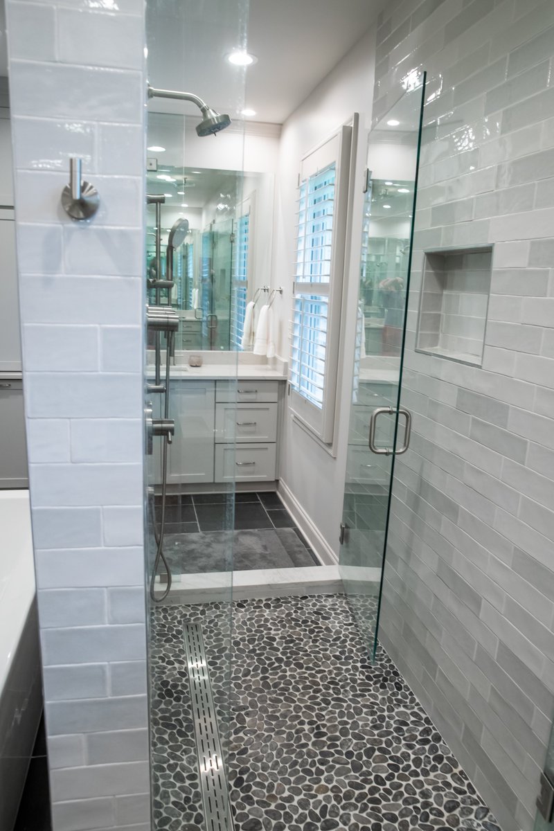 Mirrors! Make your bathroom feel larger and more elegant with lots of mirrors. Check out this bathroom by Tim Disalvo. The shower has a dual entrance!

#timdisalvo #homerenovations #bathroomrenovations