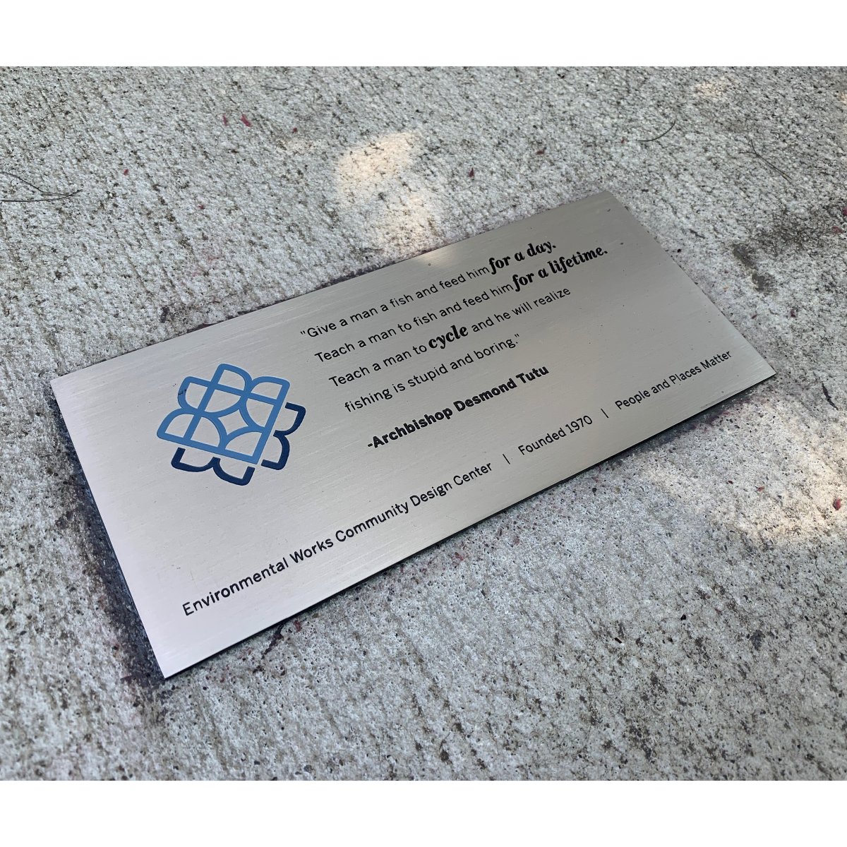 Need a place to park your wheels on 15th Ave. E.?  Check out FS7's EW-logo bike rack with newly installed plaque, celebrating EW's 50th anniversary and Roger Tucker's tenure as our past executive director!  Special shout out to Doug Hobkirk for the top-notch plaque installation!