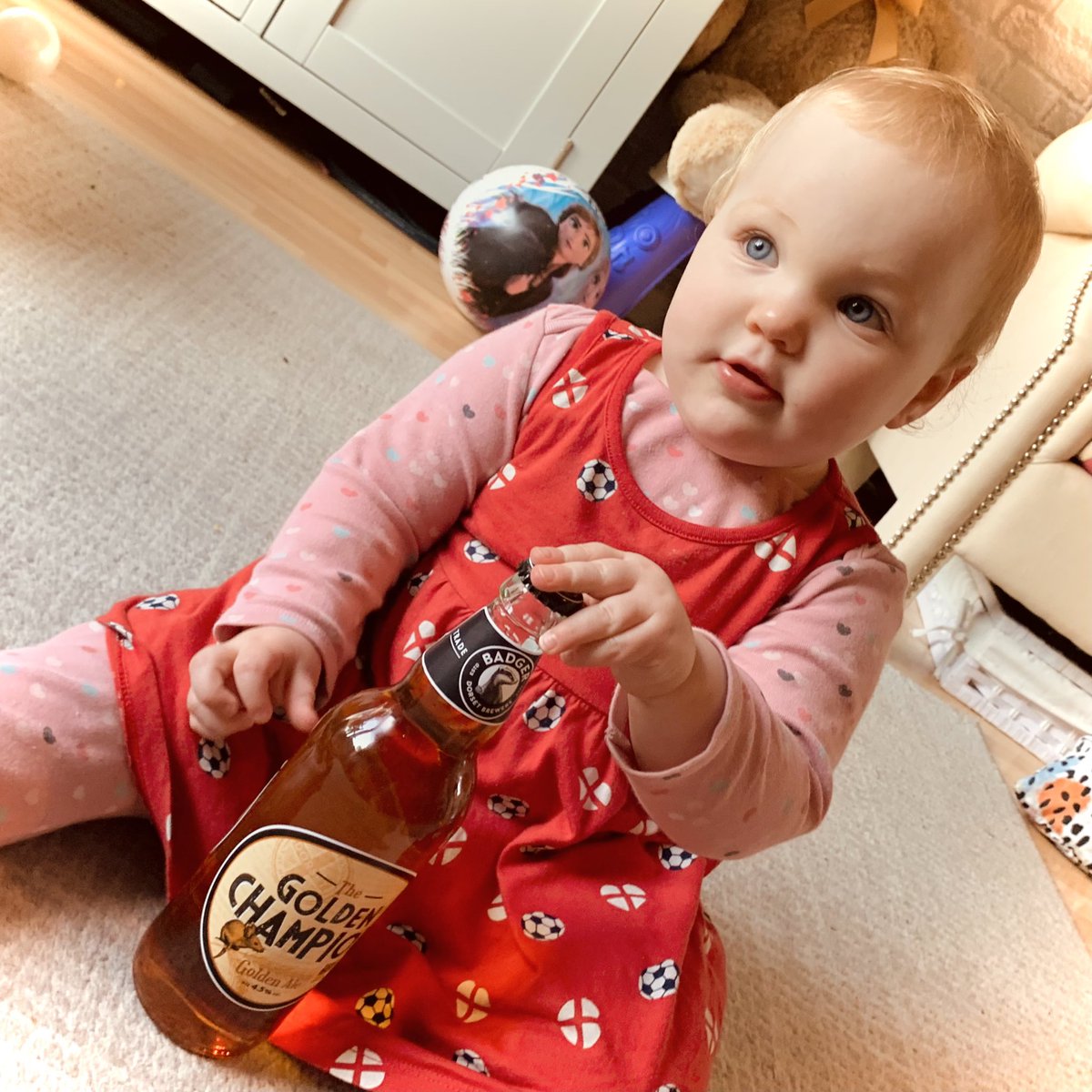 Chris_Garrity's tweet photo. Bluebell’s got her lucky dress on 😍❤️ and daddys got his lucky beer: Englands won every game when I’ve had a @Badgerales Golden Champion ⚽️🍺 https://t.co/zuFN1yrPJp