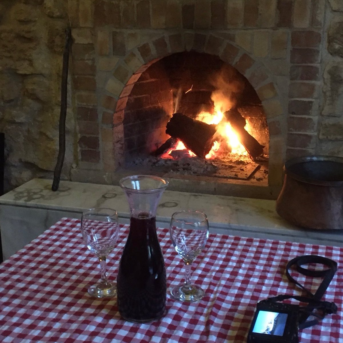 LindyLouMac's tweet photo. A throwback photo from pre Covid days when we could have travel adventures and enjoy good food and wine in front of a roaring fire. Hopefully in the not too distant future those times will return. #fmsphotoaday #fms_fire #openfire #wine #traveladventures #cyprus #pafos https://t.co/ZiGE8WUskm