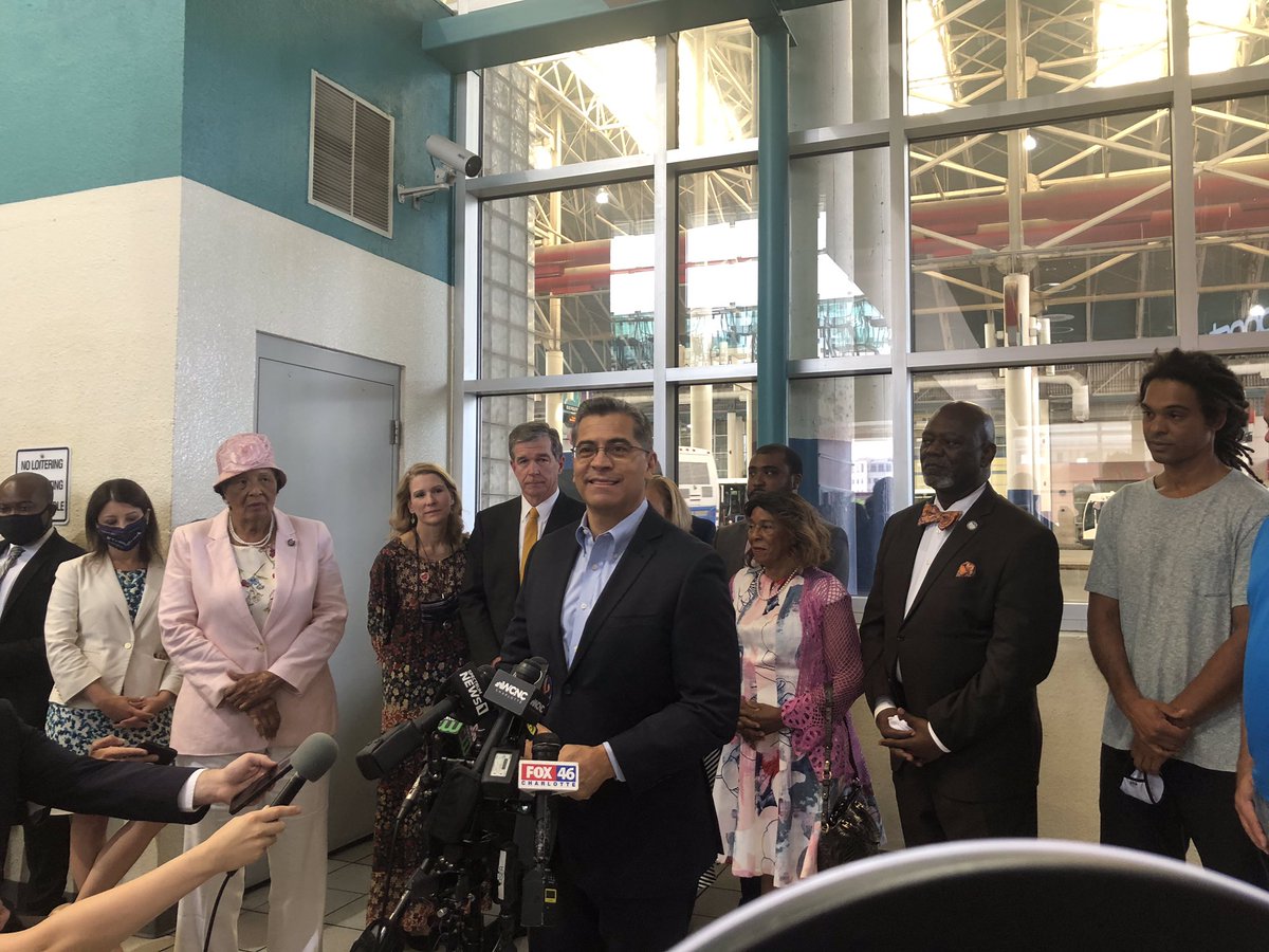 jasminaherrera's tweet photo. HHS Secretary Xavier Becerra visited a vax site in Charlotte today with Gov. Cooper and other local officials. 

My set up to this press conference? My work cell backward on a borrowed ring light (which you can see poking out in pic 2 😩): https://t.co/aJqOyG18l6