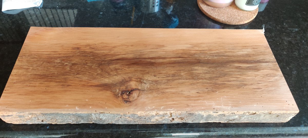 Another picture of the board, with the discoloration more prominent.  Heckin pretty in my opinion