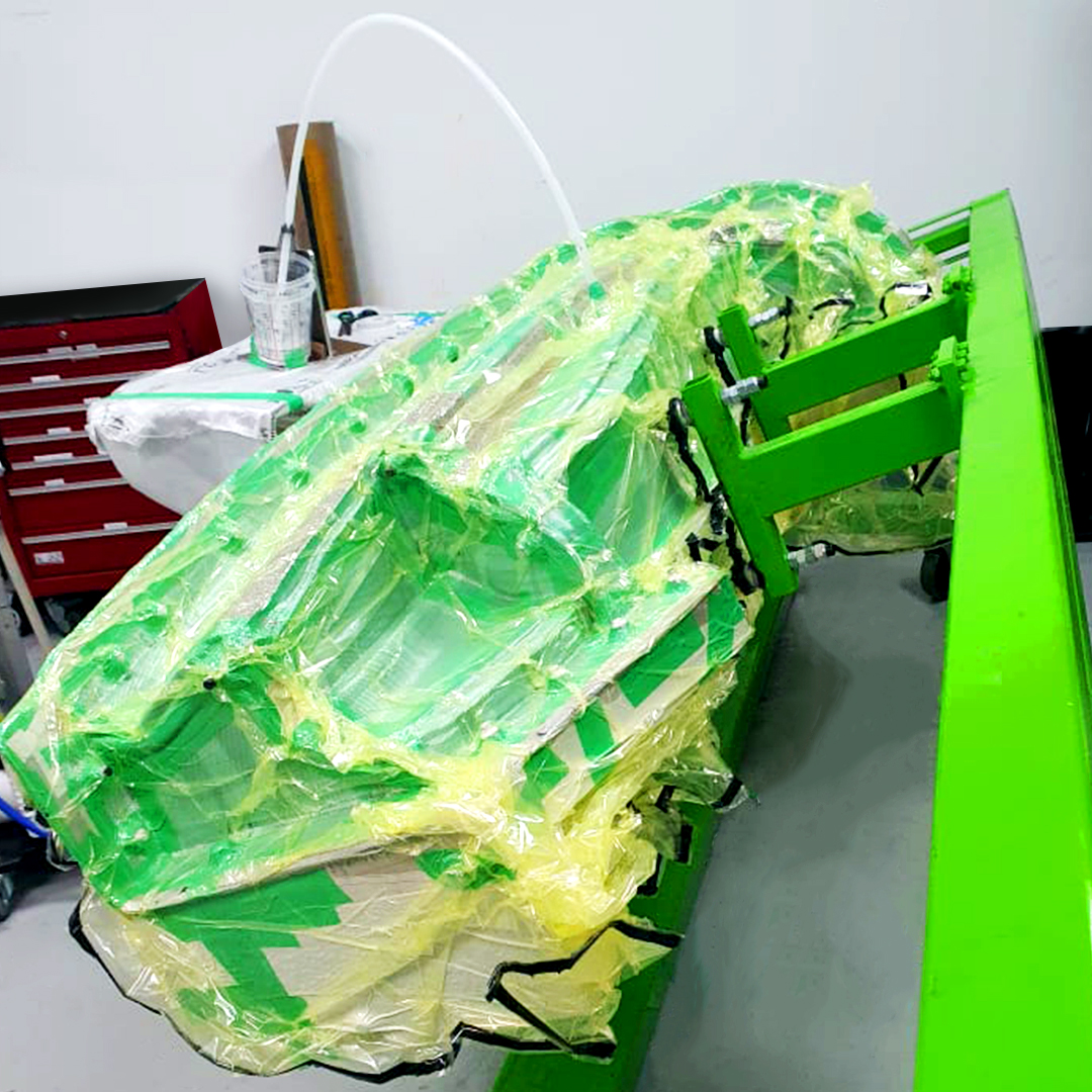 RodinCars's tweet image. The #RodinFZERO mono mould build continues. The setup is ready for resin infusion. The blue line is the vacuum and the plastic cup and hose is where the mixed resin is poured into and infused through the #carbonfibre laminate. #supercar #design #manufacturing #rodincars