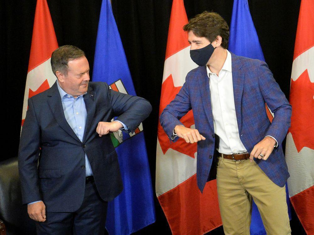 Elbow bumps all around Trudeau meets face to face with Kenney and Nenshi in Calgary