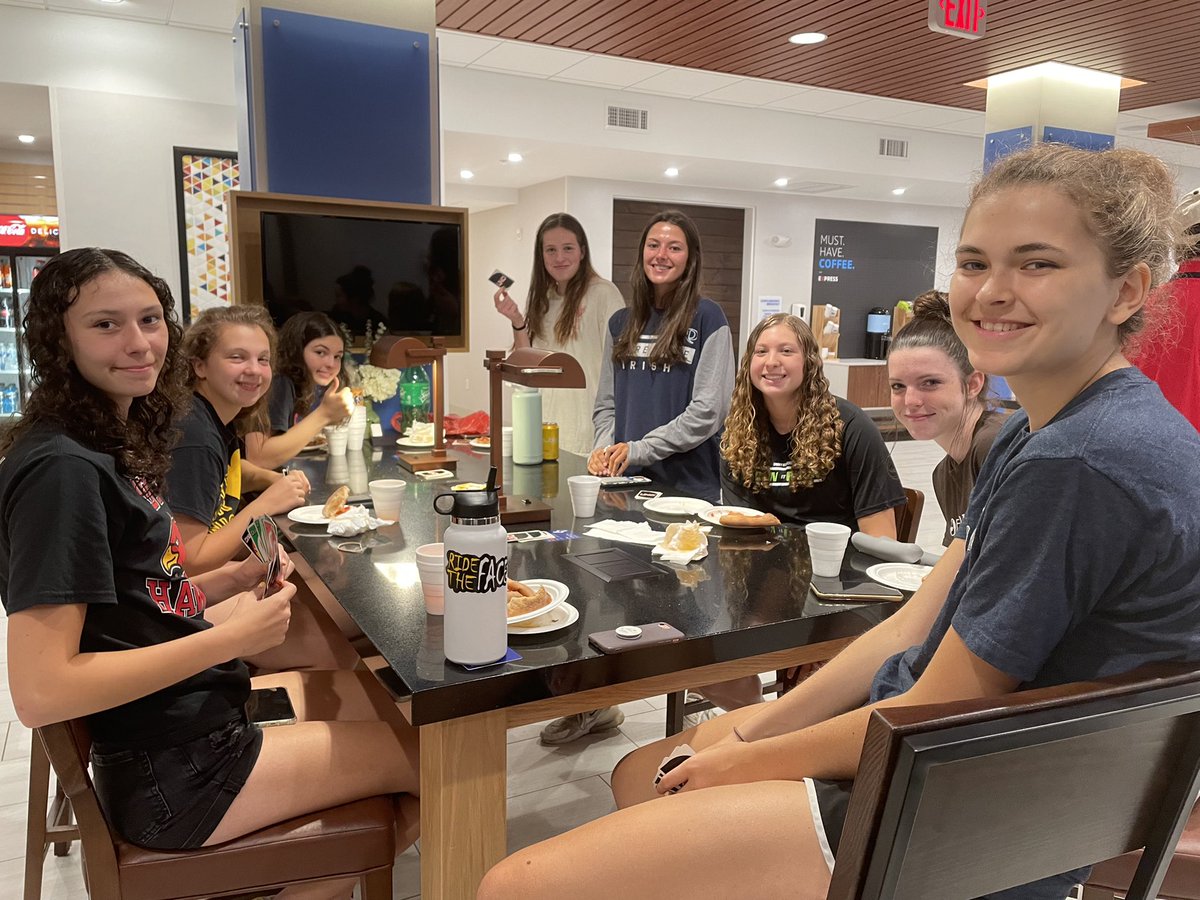 Pizza party after a tough day on the hardwood. #team #together