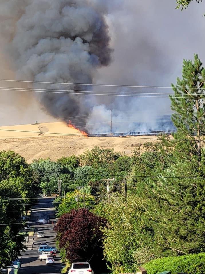 Fire not far from me. Jeff’s out on it and I’m hoping that this guy trying to make a fire break has angels guiding him.