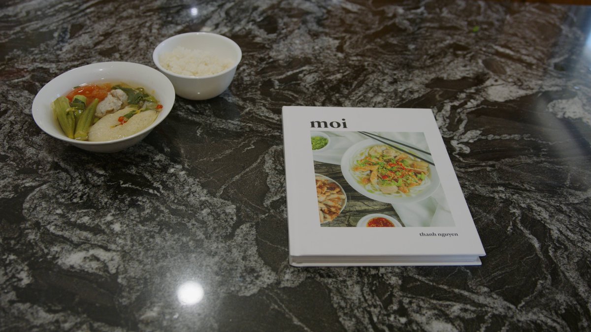 BethelU's tweet photo. Thanh Nguyen ’21 honored the women in her family by creating a Vietnamese cookbook for her senior art exhibition. “She's very, very sweet,” Thanh says of her mom as they make sweet and sour soup together. “She reminds me to be kind, and care for others.” https://t.co/WX6Qzgnrdb https://t.co/K6NSRRkE5W