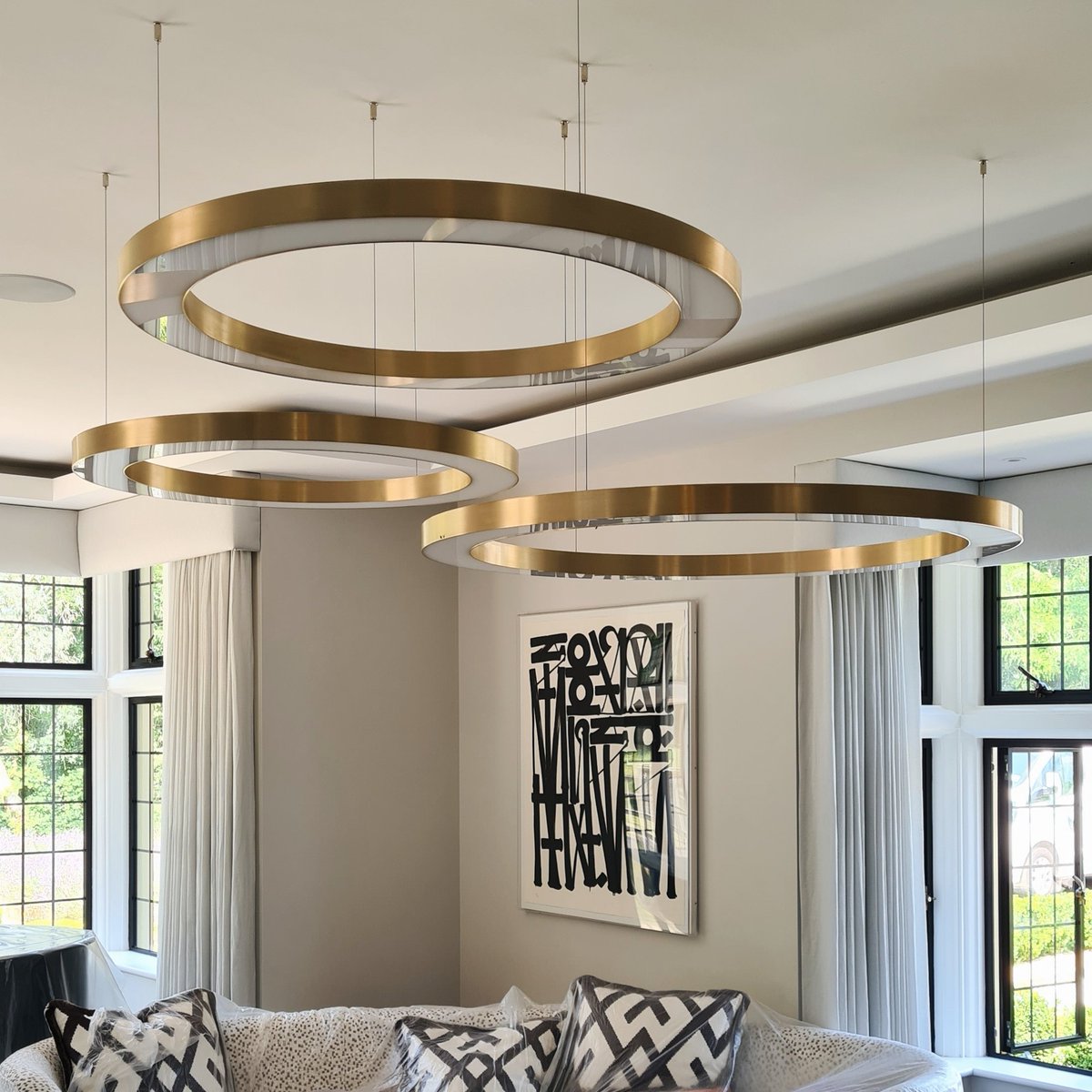 Here's a shot of our finished <a href="/camerondesign/">Cameron Design House</a> 'Mahlu' fitting - how stunning does that look?! 😎 It's a really clean installation as 2 of the 3 stainless steel wire ropes on each ring form part of the circuit which means there's no unsightly flexible cables!

#Electrician #Bespoke