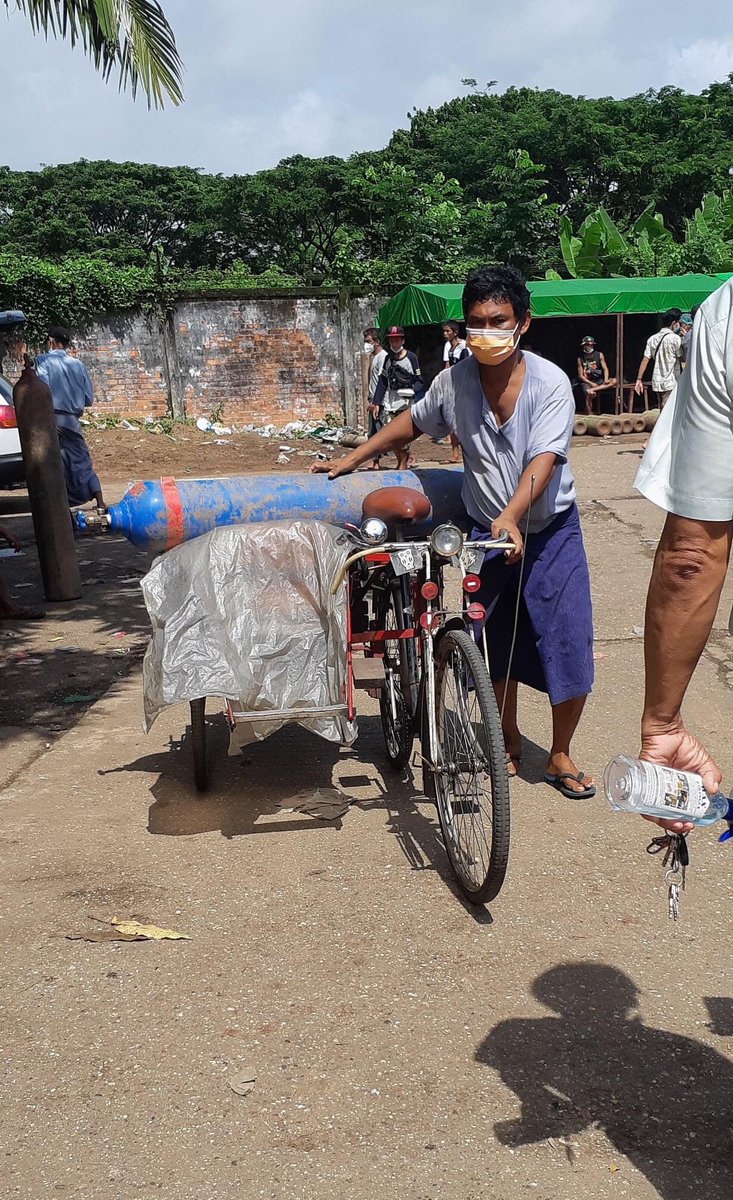 KeraJale's tweet photo. Today Scenes of civilians from #Yangon queued for refilling of Oxygen Cylinders. 

#WhatsHappeningInMyanmar
#July23Coup
#ICJ_BringSACToJustice 
#PrisonersWithCovid_NeedRx 
#MyanmarCovidSOS 
#MyanmarNeedsO2 https://t.co/hstZzPTuSy