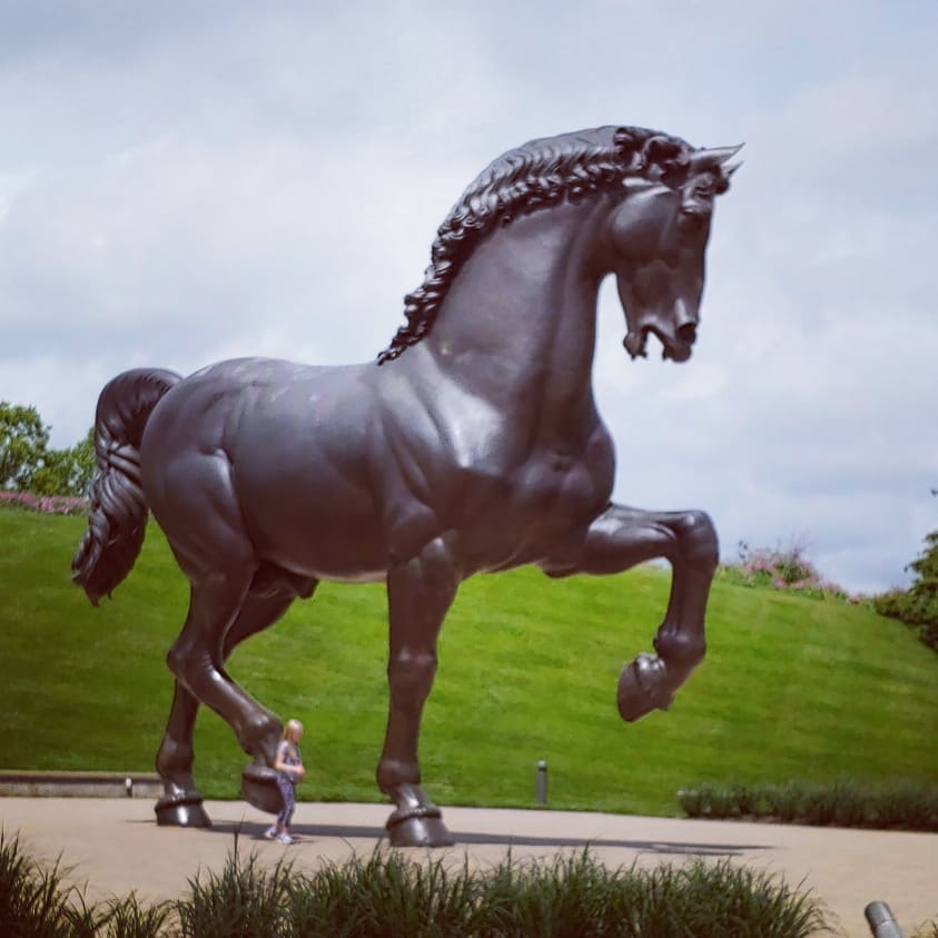 A2 #MWTravelChat
Favorite Outdoor Sculpture Parks? We recommend <a href="/MeijerGardens/">Meijer Gardens</a> in Grand Rapids, Michigan. My kids are obsessed with the giant horse sculpture there. (See my little girl in this picture for a size reference.)