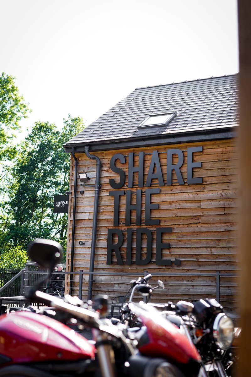 GoodwinDesign's tweet photo. So good to see the signs up for @bafflehaus. Undoubtedly the best motorcycle destination in Wales but also the most amazing cakes and coffee in a really cool countryside setting run by top guys! #signswithsoul #sharetheride https://t.co/sB6ASSSgSI