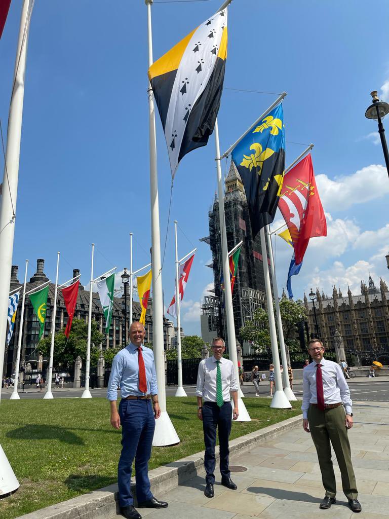 jamesowild's tweet photo. With #NorfolkDay next week great to mark the flying of our county flag alongside other historic counties in Parliament Square today with my fellow new Norfolk MPs @duncancbaker @JeromeMayhew #jacketsoff https://t.co/lfdjuyNPZg