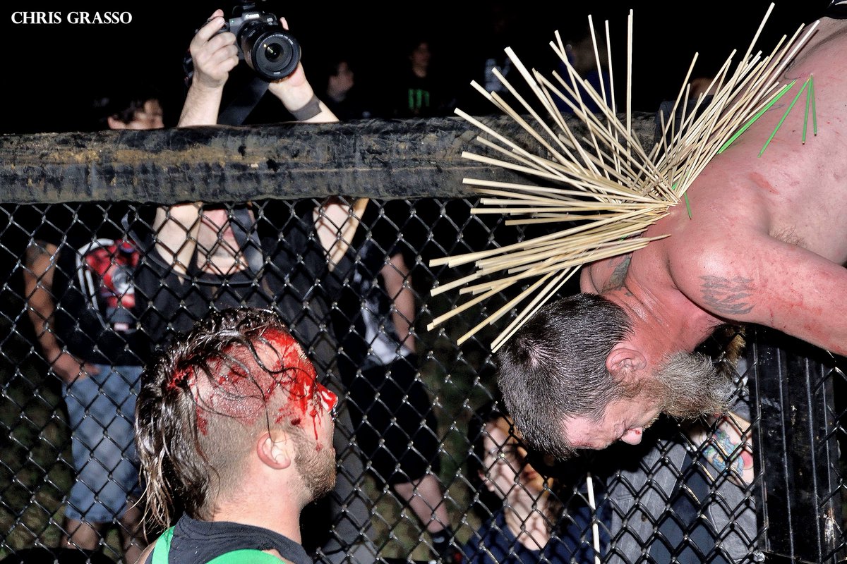 Ringsideguy's tweet photo. From @ICWNHB Pitfighter X9 #PFX9 Match #4 @Atticus_Cogar vs. @FearlessNeil 3/3 https://t.co/dYDeqtUBOK