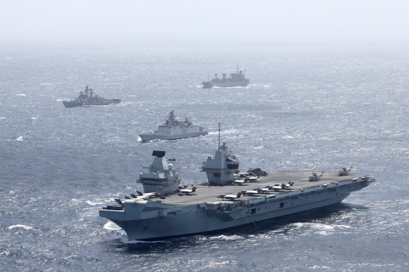 HMS Queen Elizabeth pictured with Indian naval vessels.