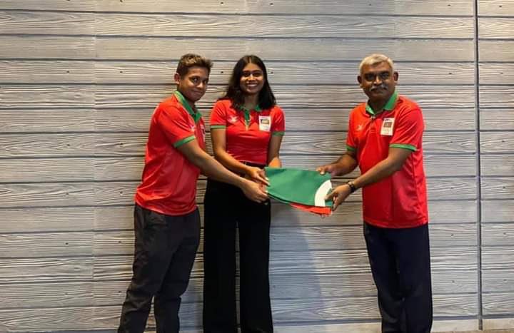 Champi8080's tweet photo. Officially handed over the Maldivian flag to Nabaaha and Mubal who has been selected as the dual flag-bearers of Team Maldives for the opening ceremony of the Tokyo 2020 Olympics Games 

@BAMDV, @MDVswim @nocmaldives https://t.co/H33kxuVIAM
