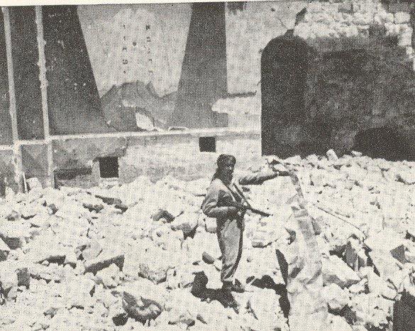 StandWithUs's tweet photo. This is #Jerusalem during the Jordanian occupation, prior to the reunification of the city on June 5, 1967. 
Jordan destroyed the entire Jewish Quarter of the Old City, including 52 synagogues. Pictured is a Jordanian soldier standing on the ruins of Hurva Synagogue. https://t.co/SXGiHocCZx