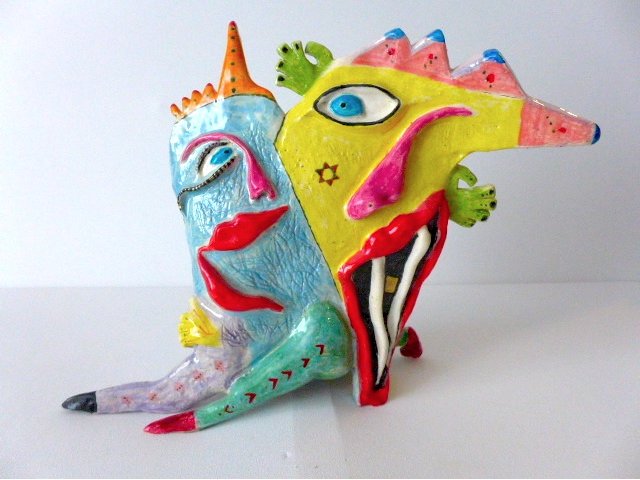 Next up in the Gallery
Two Sides of a Story
David Dawkins, Ceramic sculptures
July 23 - 28
Each one of David’s sculptures has two sides to them, like a two-page book, and each one has a true story behind them. They are caricatures of various people he has known over the years.