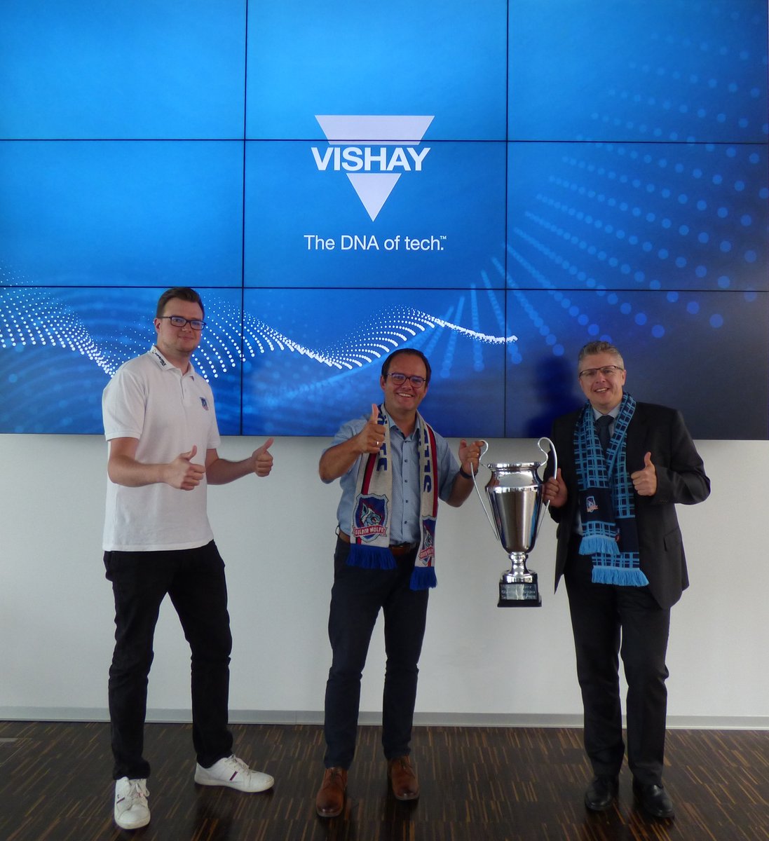 VishayIndust's tweet photo. The Ice Hockey championship trophy won by the VER Selb after a great season, makes its next stop at Vishay Electronic GmbH. It will be on display for a few days for local Vishay employees. We wish the Selber Wölfe success after their promotion to DEL2. #TheDNAofTech #verselb https://t.co/ab1au4T2E2