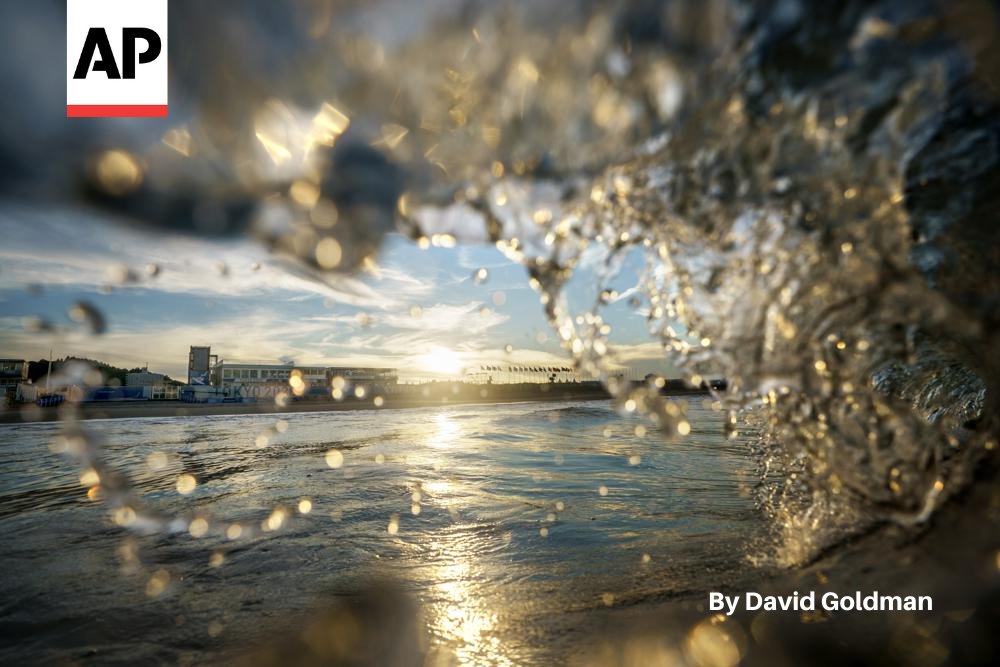 AP Photographer <a href="/DavidGoldmanAP/">David Goldman</a> floated into the water at Tsurigasaki beach Wednesday after surfers finished practice to capture a competitor's view. 

"Ultimately, you get the perspective of what a surfer might see," he said. 

Full AP Olympics coverage: apne.ws/nrgbikS