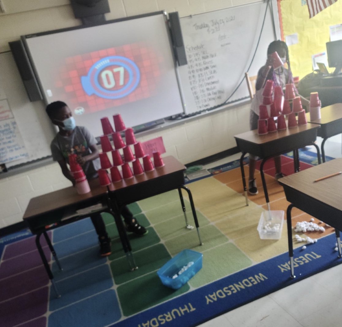 CroftColts's tweet photo. The students in Ms. McGuire's #campcms class learned about the Olympics all week. Today, they participated in several Camp CMS Olympic Games in the classroom. They had a blast while remaining socially distanced. @CharMeckSchools https://t.co/ItZYx75SRU
