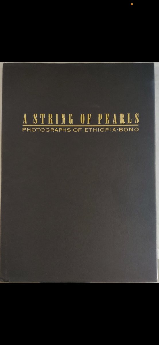 bradleysmorgan's tweet photo. Spent months trying to find this extremely rare book, and I splurged as soon as I did. A gift to myself for finishing my book last month. #u2 #bono #astringofpearls https://t.co/m7HDxguxgj
